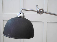 An Adjustable Nickel Plated Floor Lamp
