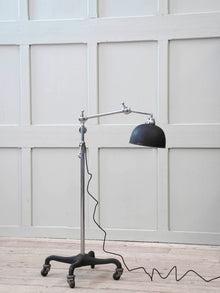 An Adjustable Nickel Plated Floor Lamp