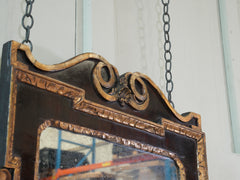 A George II Carved Giltwood & Walnut Veneered Mirror