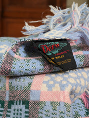 A Periwinkle and Pink Derw Tapestry Blanket