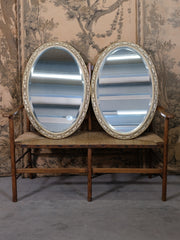 A Pair of Oval Mirrors