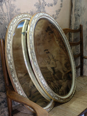 A Pair of Oval Mirrors