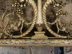 A Large Neo Classical Carved & Gilt Mirror