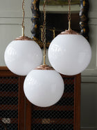 The Tomkin Opaline Glass Pendant in Polished Copper