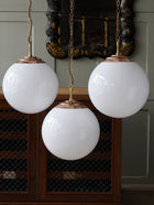 The Tomkin Opaline Glass Pendant in Polished Copper
