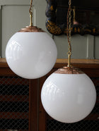 The Tomkin Opaline Glass Pendant in Polished Copper