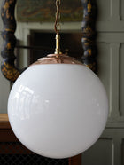 The Tomkin Opaline Glass Pendant in Polished Copper