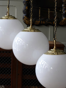 The Tomkin Opaline Glass Pendant in Polished Brass