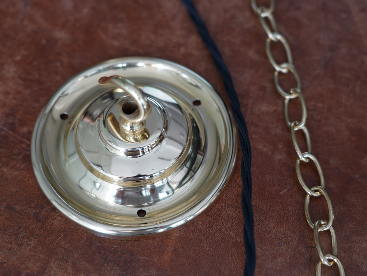 The Tomkin Opaline Glass Pendant in Polished Brass