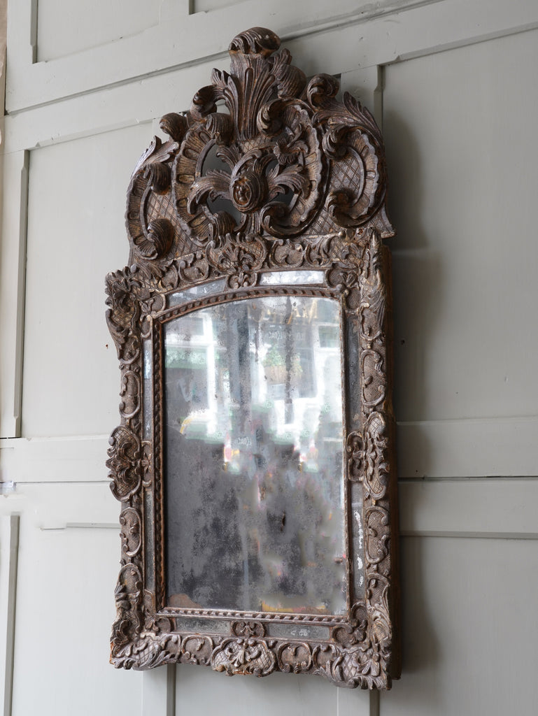 An Early 18th Century Gilt-wood Mirror