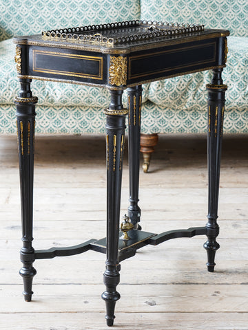 A 19th Century Ebonised and Ormolu Mounted Side Table