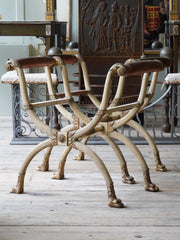 A Pair of X Frame Stools by Morel & Hughes