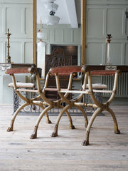 A Pair of X Frame Stools by Morel & Hughes