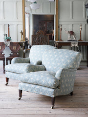 A Pair of Howard & Sons Bridgewater Armchairs