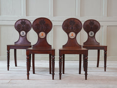 A Set of Four Regency Mahogany Hall Chairs