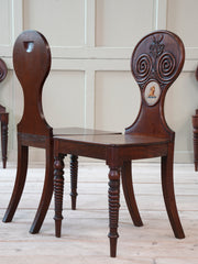 A Set of Four Regency Mahogany Hall Chairs