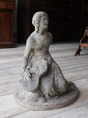 A Marble Seated Girl with Guitar