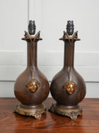 A Pair of Twin Handled Copper Vase Table Lamps