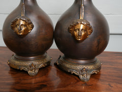 A Pair of Twin Handled Copper Vase Table Lamps