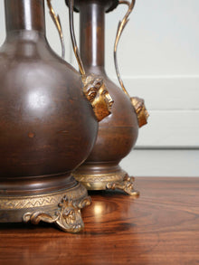 A Pair of Twin Handled Copper Vase Table Lamps