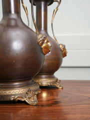 A Pair of Twin Handled Copper Vase Table Lamps