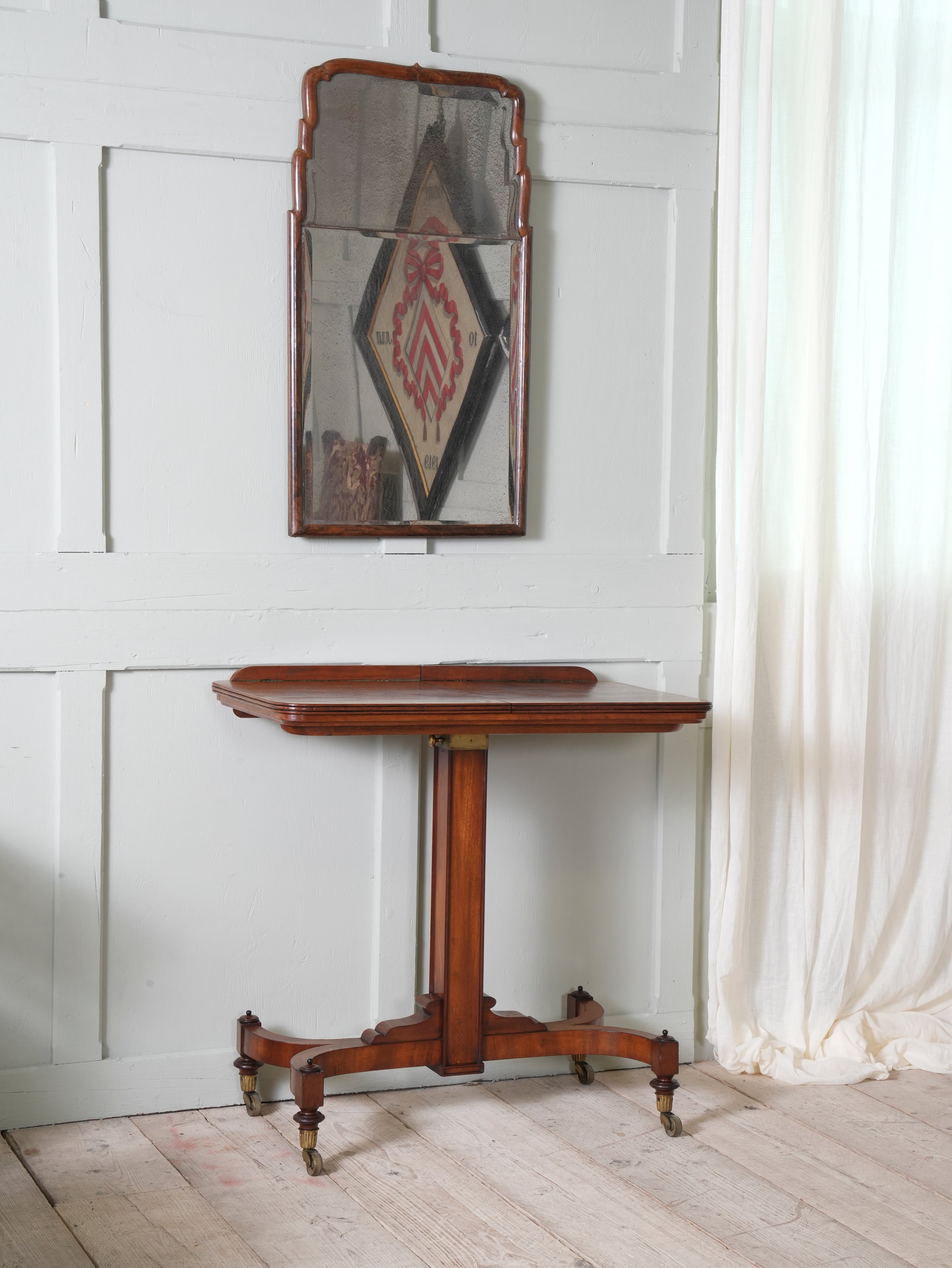 A Queen Anne Mahogany Pier Mirror
