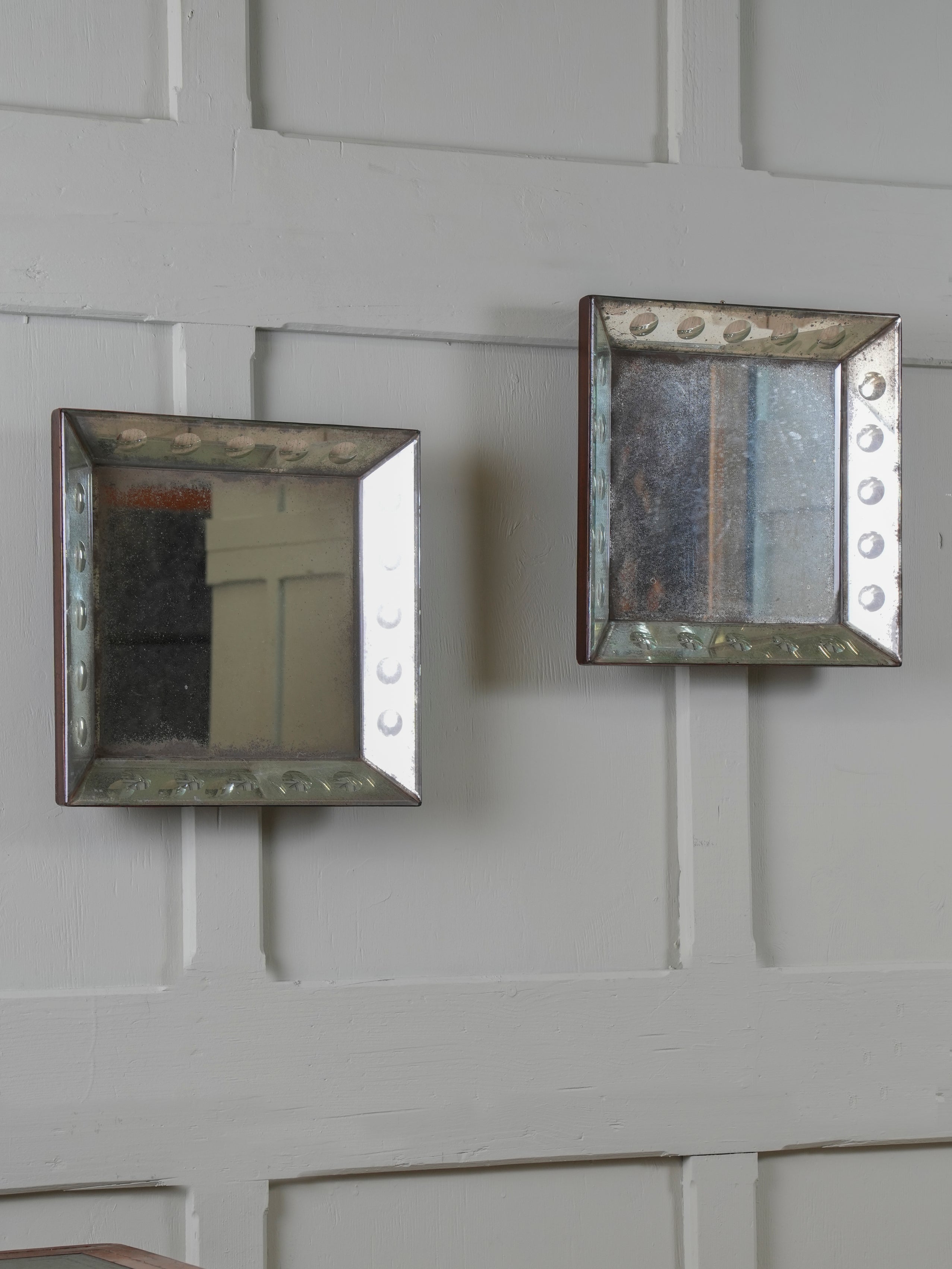 A Pair of Bevelled Wall Mirrors