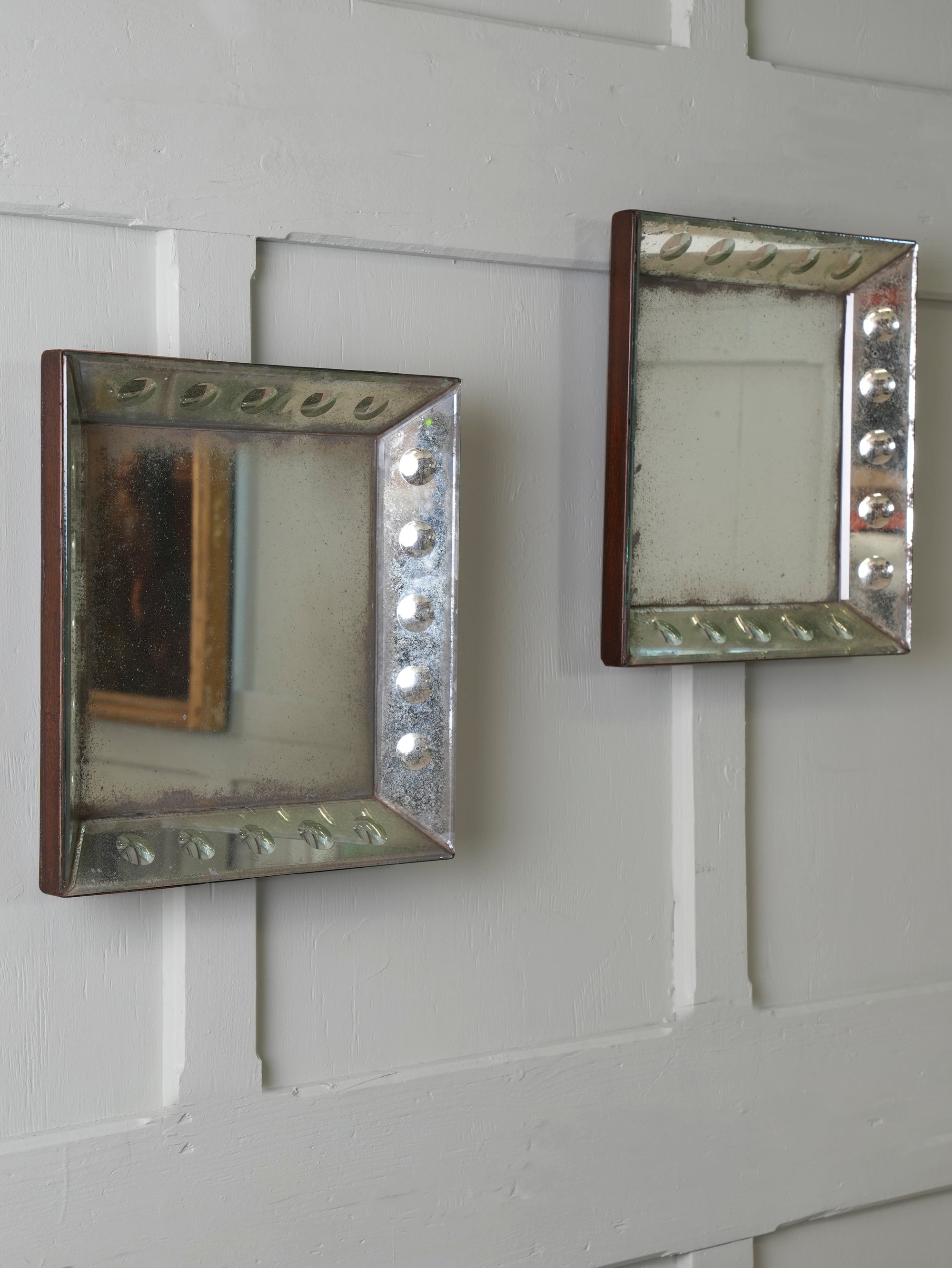 A Pair of Bevelled Wall Mirrors