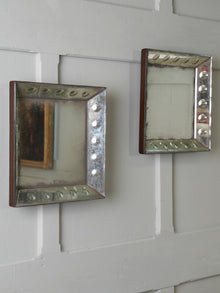 A Pair of Bevelled Wall Mirrors