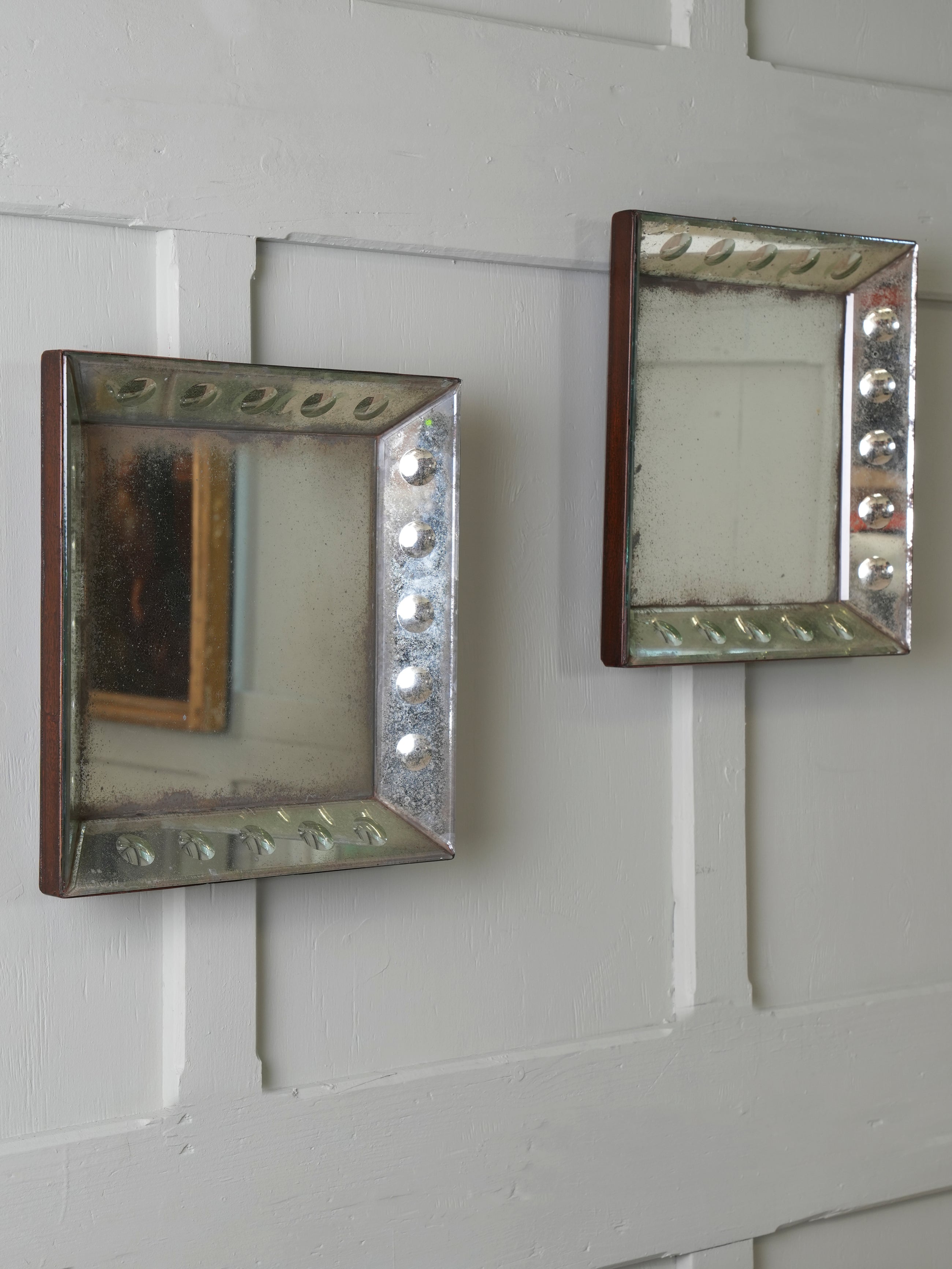 A Pair of Bevelled Wall Mirrors