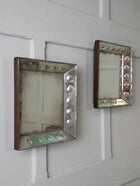 A Pair of Bevelled Wall Mirrors
