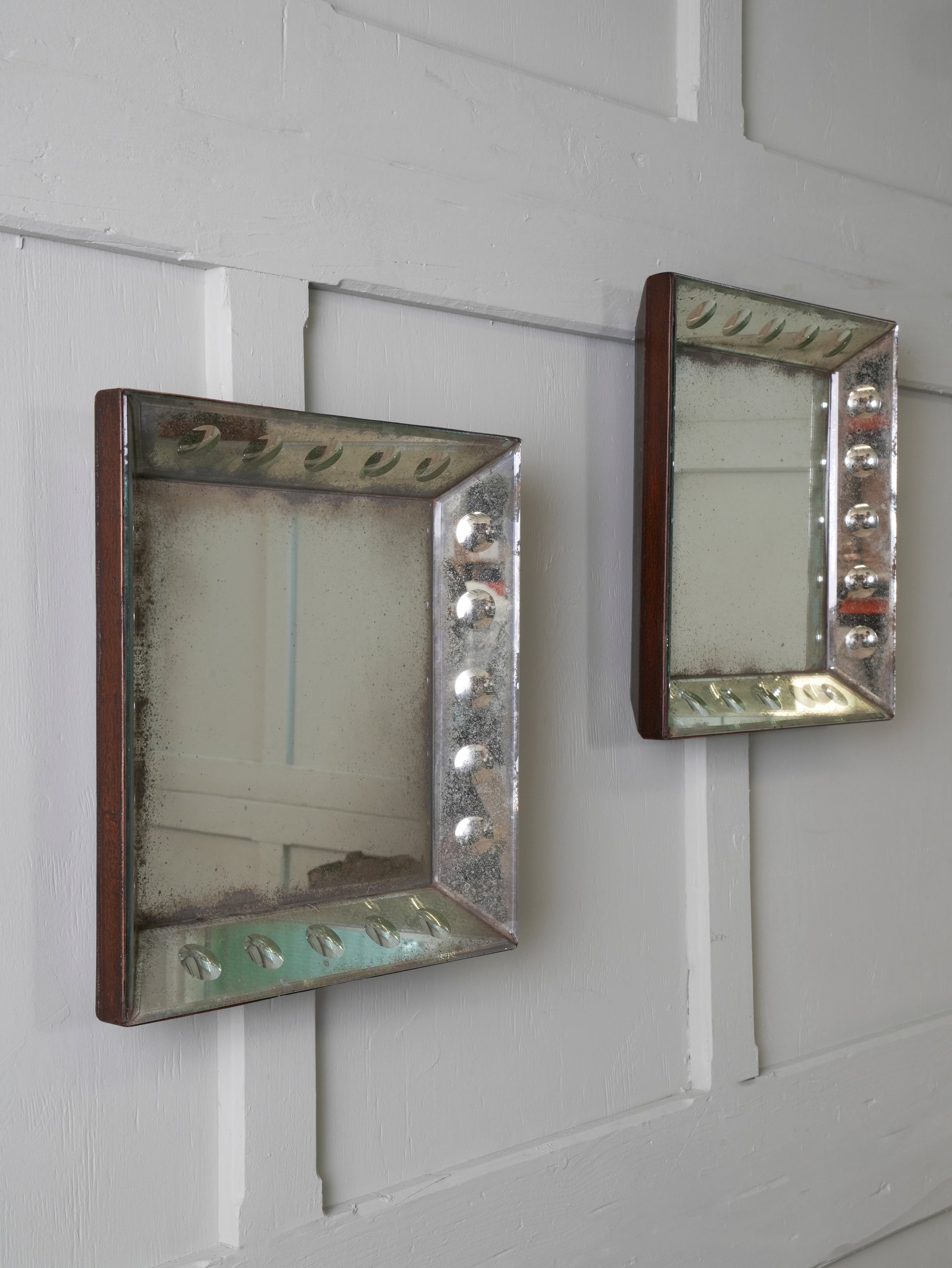 A Pair of Bevelled Wall Mirrors