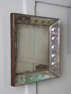 A Pair of Bevelled Wall Mirrors