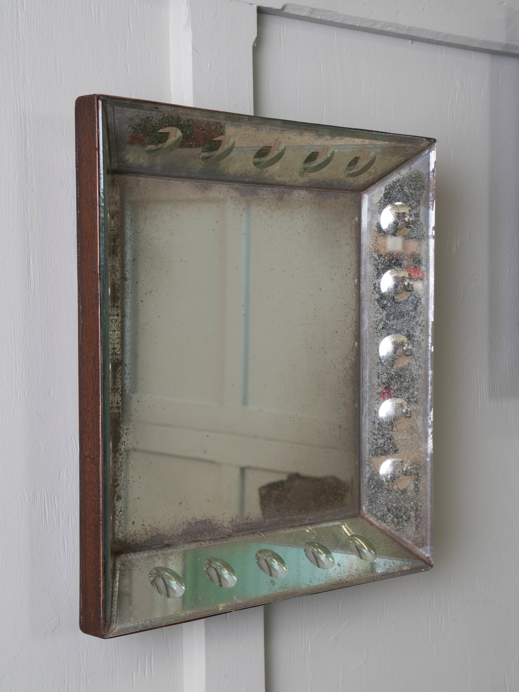 A Pair of Bevelled Wall Mirrors