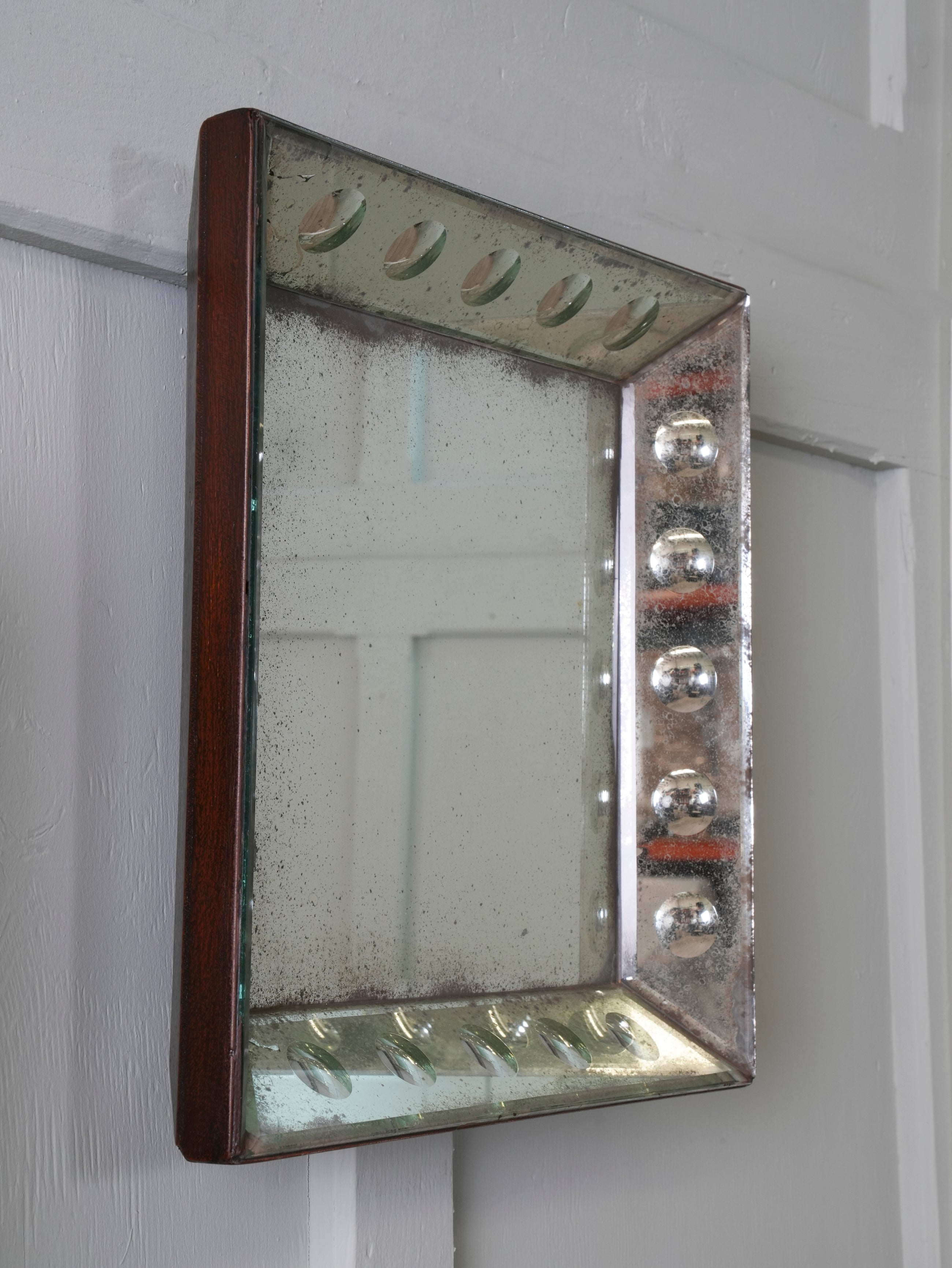 A Pair of Bevelled Wall Mirrors