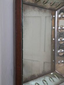 A Pair of Bevelled Wall Mirrors