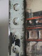 A Pair of Bevelled Wall Mirrors