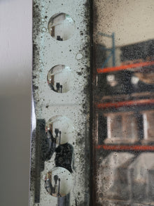 A Pair of Bevelled Wall Mirrors