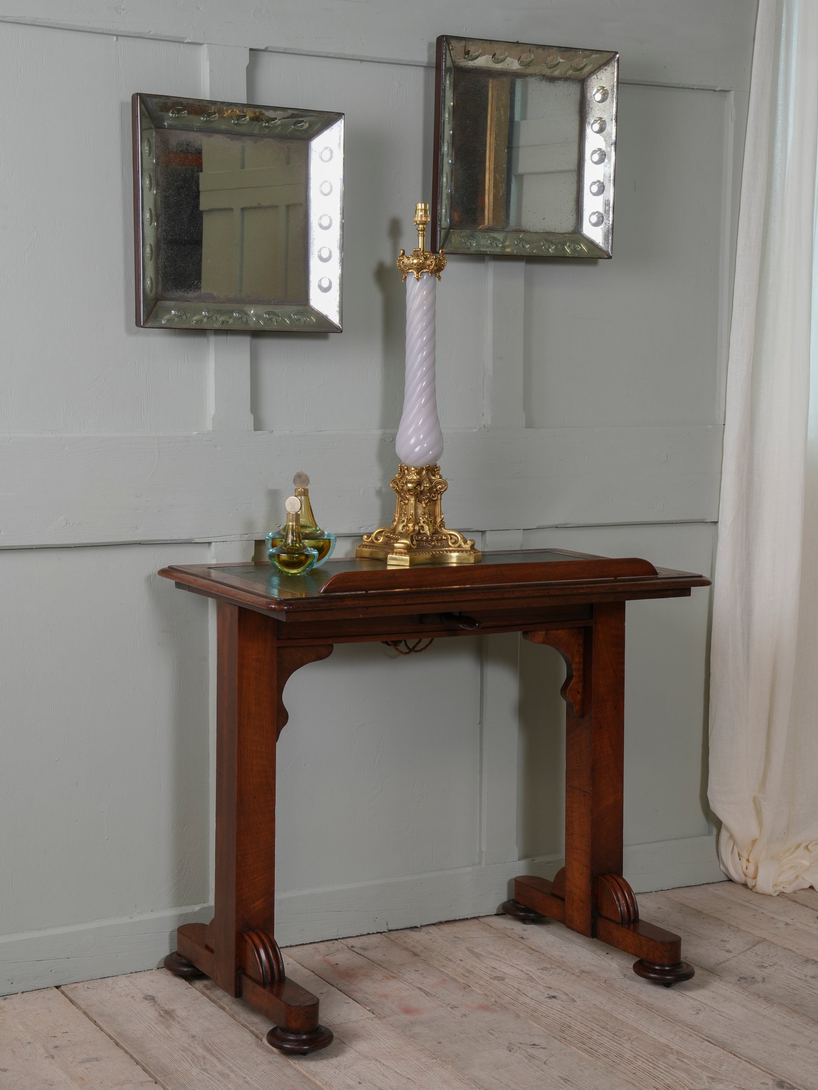 A Pair of Bevelled Wall Mirrors