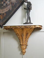 A Pair of 19th Century Bracket Console Tables