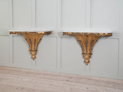 A Pair of 19th Century Bracket Console Tables