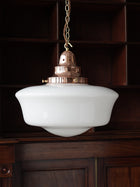 The Capel Bach Opaline Glass Pendant in Polished Copper