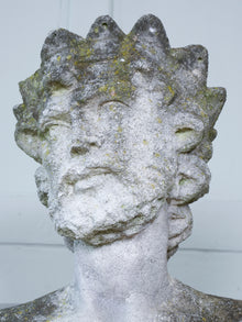 A Carved Stone Standing Male Figure with Crown