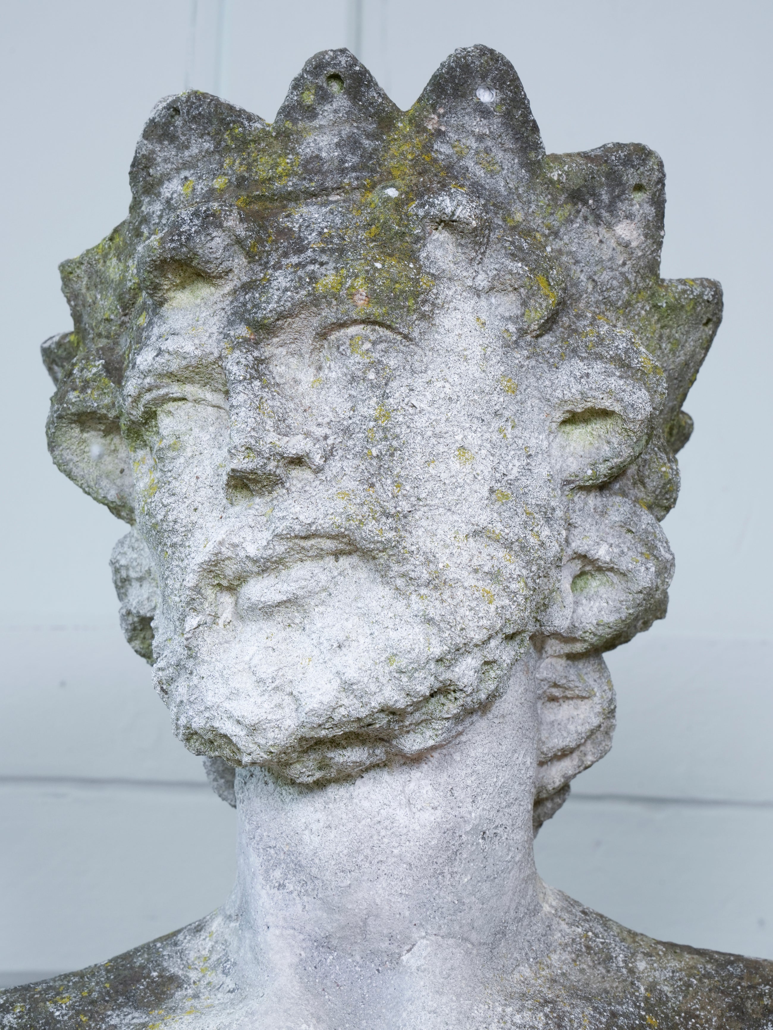 A Carved Stone Standing Male Figure with Crown