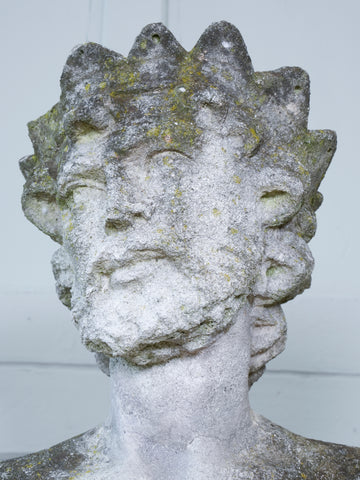 A Carved Stone Standing Male Figure with Crown