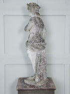 A Carved Stone Standing Male Figure with Crown