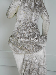 A Carved Stone Standing Male Figure with Crown