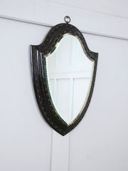 An Ebonised & Brilliant Cut Shield Mirror