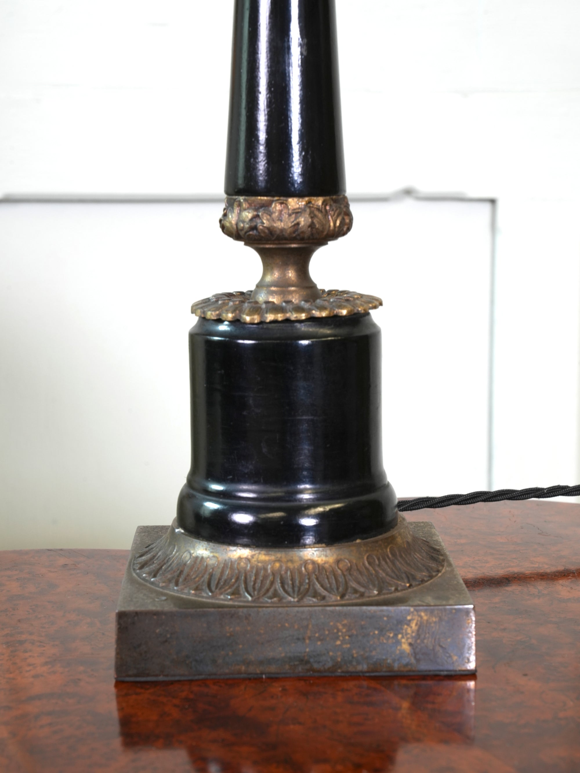 An Ebonised Timber Table Lamp