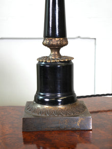 An Ebonised Timber Table Lamp